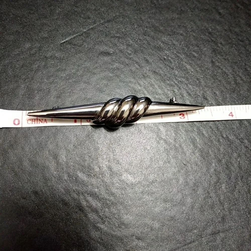 Silver tone long pointy pin brooch